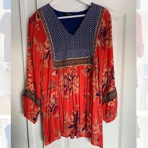 Adorable bright colored blouse size large.